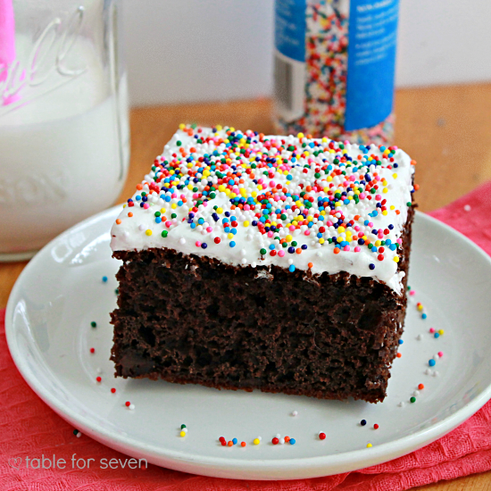 Chocolate Pudding Cake with Fluffy White Frosting #cake #chocolate #puddingcake #chocolatecake #tableforsevenblog #dessert 