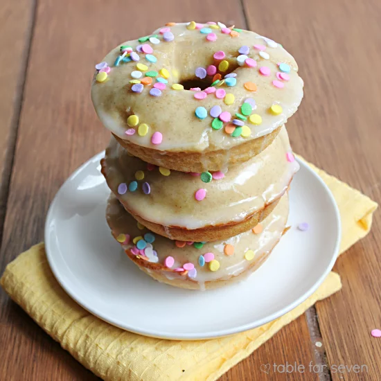 Glazed Baked Yogurt Doughnuts #doughnuts #donuts #yogurt #glazeddoughnuts #glaze #tableforsevenblog