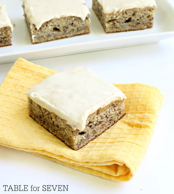 Banana Snack Cake with Banana Cream Cheese Frosting #tableforsevenblog #banana #bananacake #frosting #creamcheese #snackcake #dessert