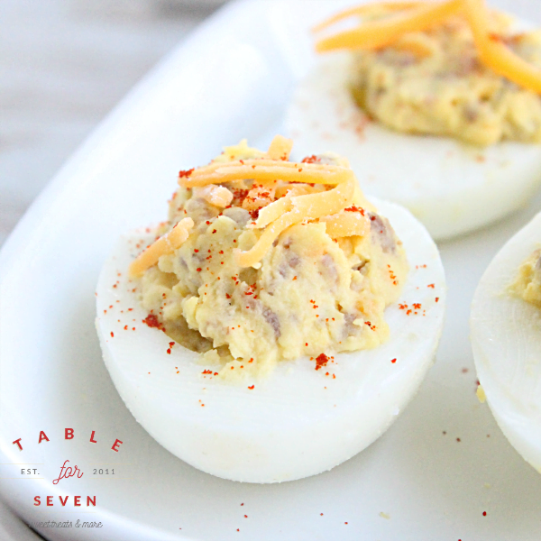 Sausage and Cheddar Deviled Eggs #deviledeggs #sausage #cheese #tableforsevenblog