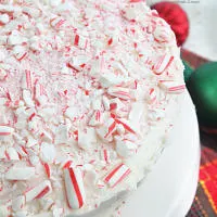 Peppermint Layer Cake #peppermint #layercake #cake #tableforsevenblog #whitecake #holidaybaking