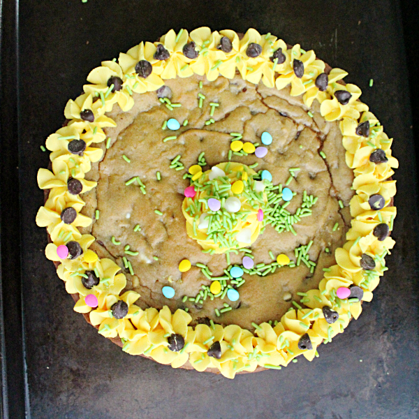 Chocolate Chip Cookie Cake #cookiecake #cake #chocolatechip #dessert #tableforsevenblog @tableforseven 