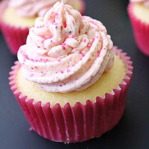 Lemon Cupcakes with Fresh Strawberry Buttercream Frosting from Table for Seven