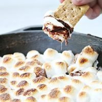 S'mores Skillet Dip #smores #skillet #dip #chocolate #ironskillet #marshmallows #grahamcrackers #tableforsevenblog @tableforseven
