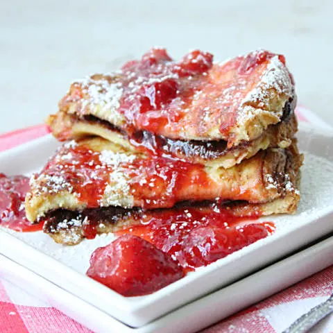 Chocolate Stuffed French Toast with Strawberry Syrup #chocolate #strawberry #syrup #tableforsevenblog @tableforseven #breakfast #frenchtoast