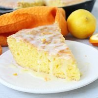 Iron Skillet Lemon Cake with Orange Glaze @tableforseven #tableforsevenblog #lemon #cake #orange #ironskillet #dessert