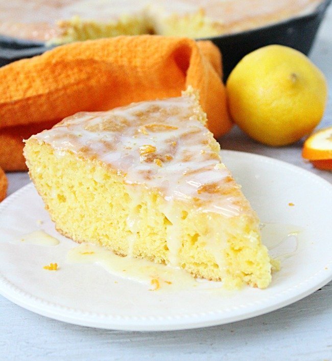 Iron Skillet Lemon Cake with Orange Glaze @tableforseven #tableforsevenblog #lemon #cake #orange #ironskillet #dessert 