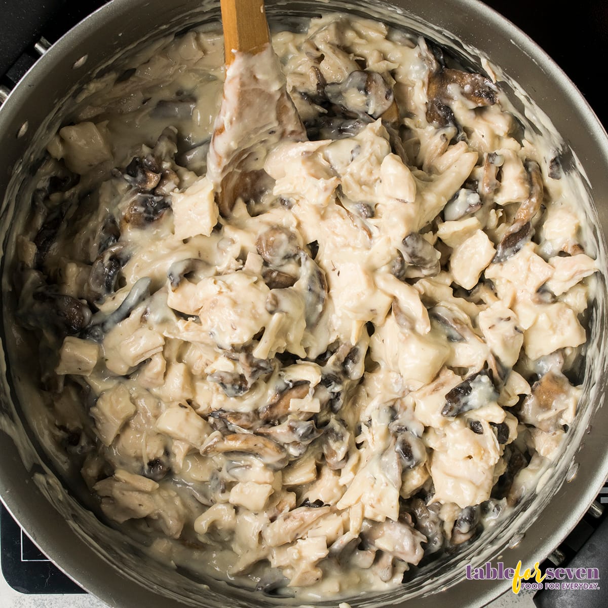 Combination of sautéed mushrooms and turkey mixed in a creamy sauce.