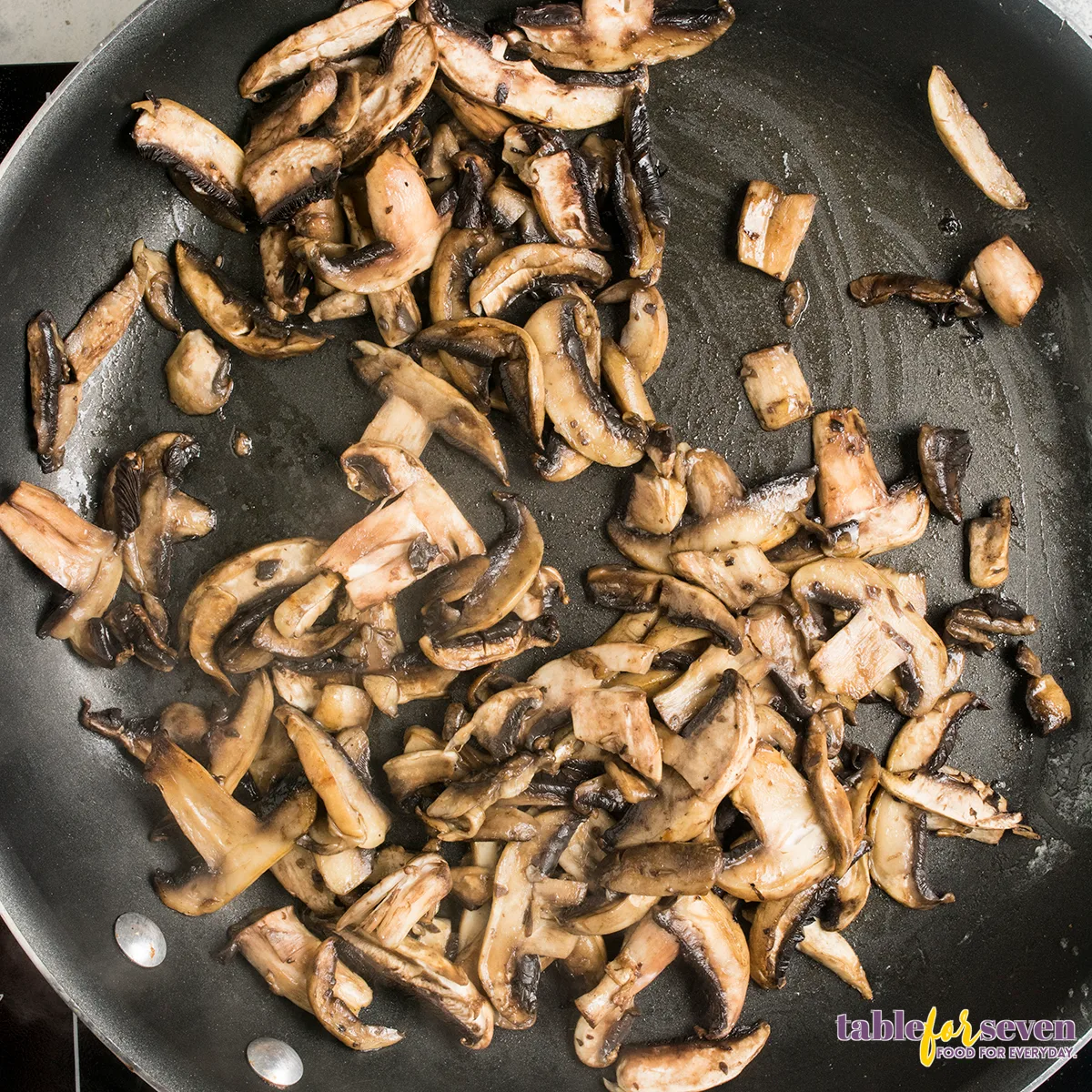 Sautéed mushrooms in a skillet, 