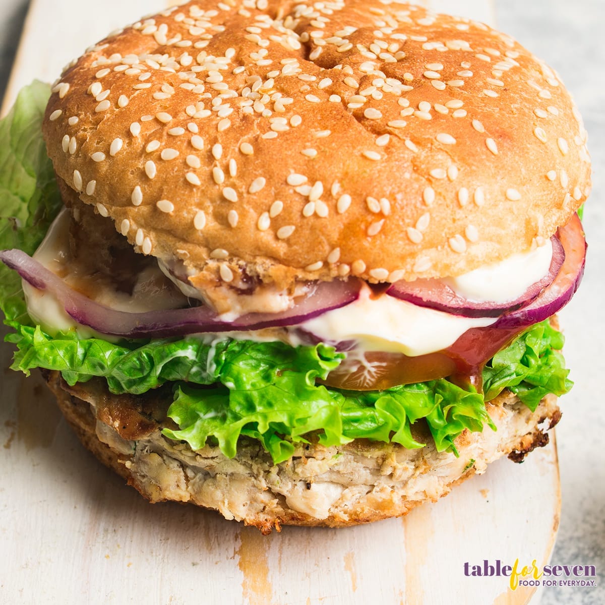 Top view of turkey burger with lettuce and mayonnaise