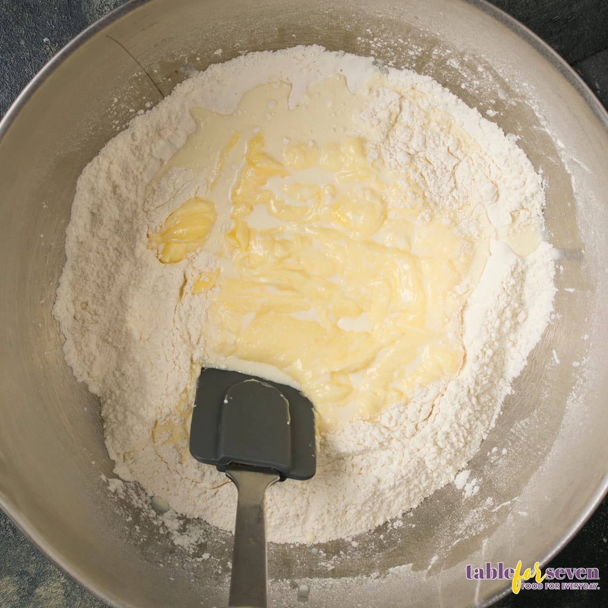 Biscuit dough mixture in a mixing bowl before baking