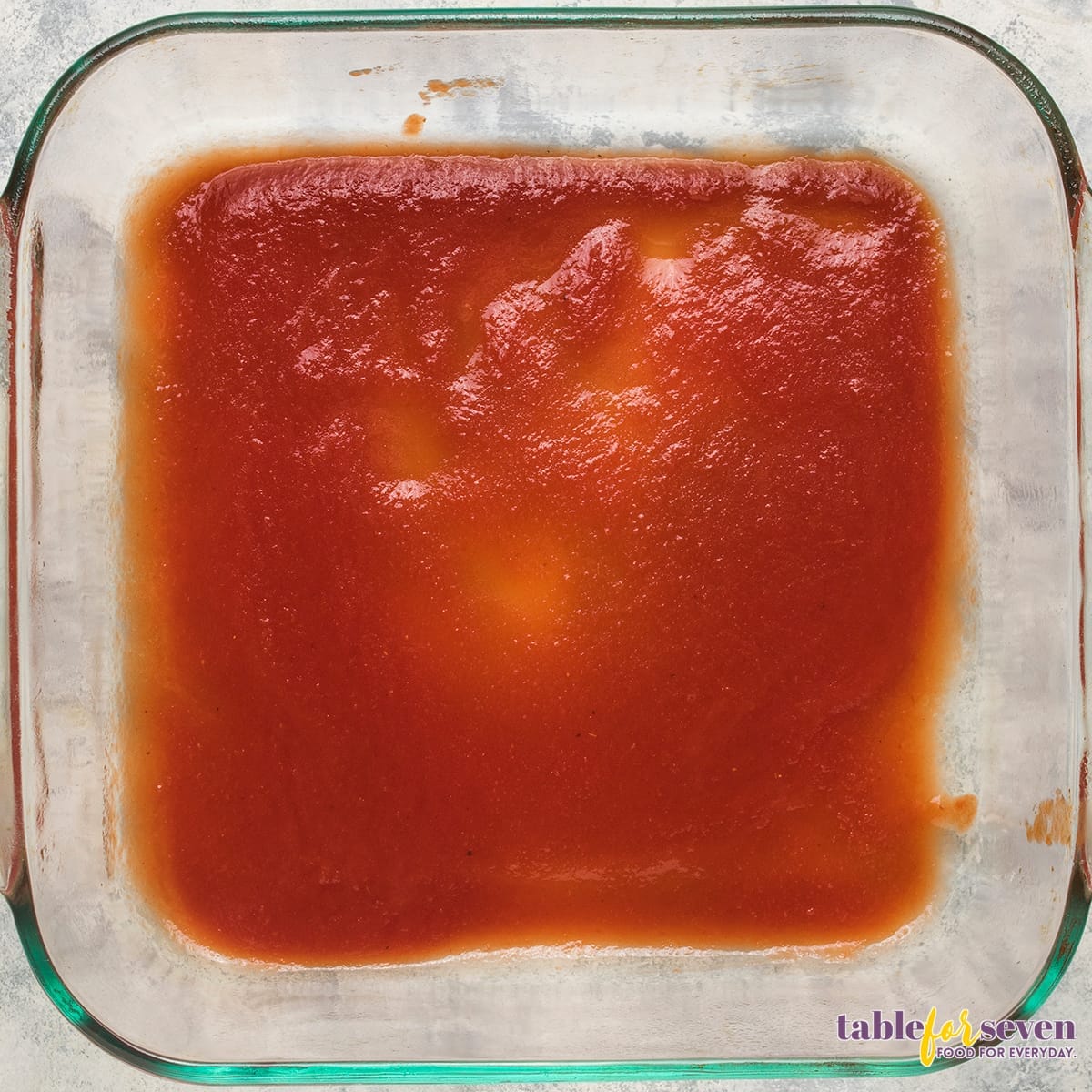 Layer of Red Enchilada Sauce for Chicken Enchilada Casserole