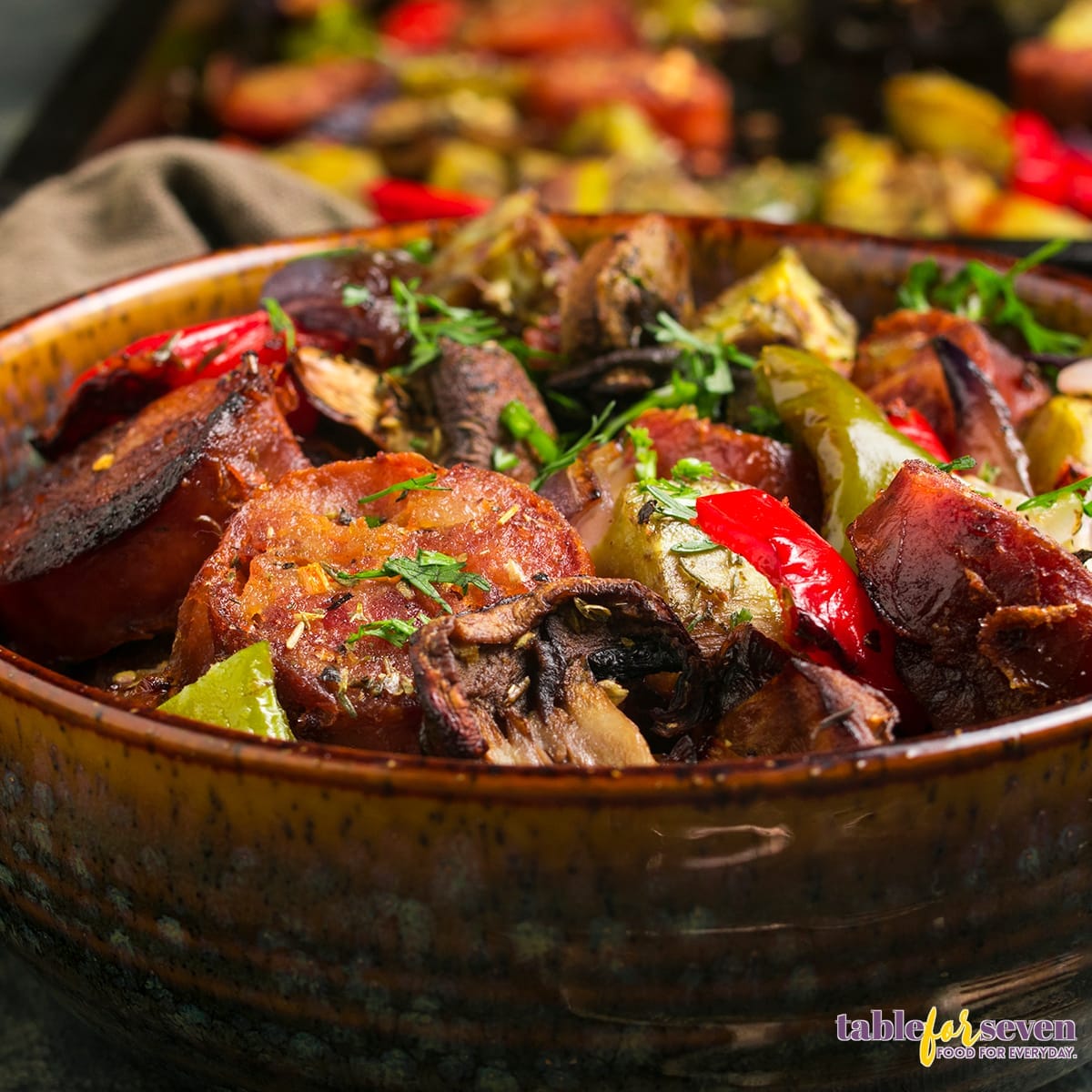 Sausage and vegetables served in a rustic bowl