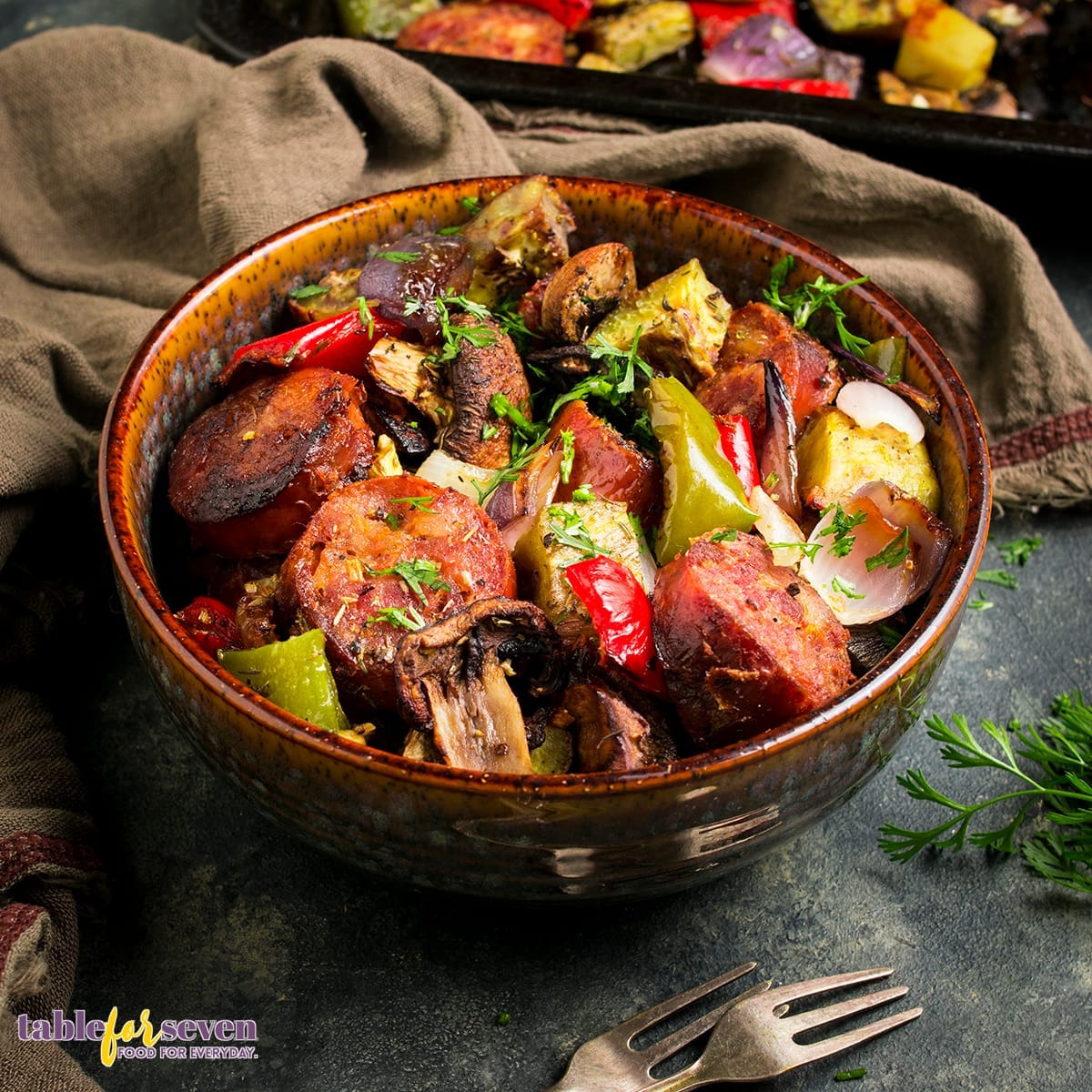 Close-up of seasoned sausage and vegetables in a bowl"