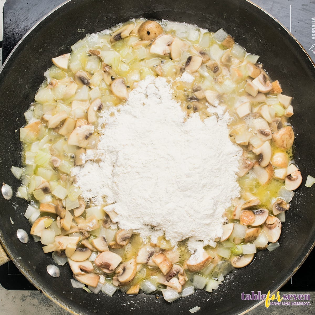 Adding flour to the mushroom and onion mixture for Chicken Ala King