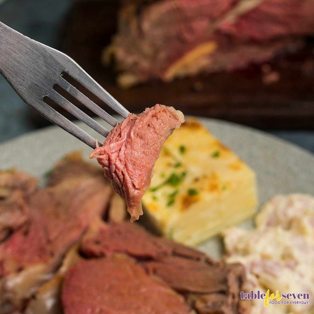 Fork holding a tender slice of Gordon Ramsay's prime rib