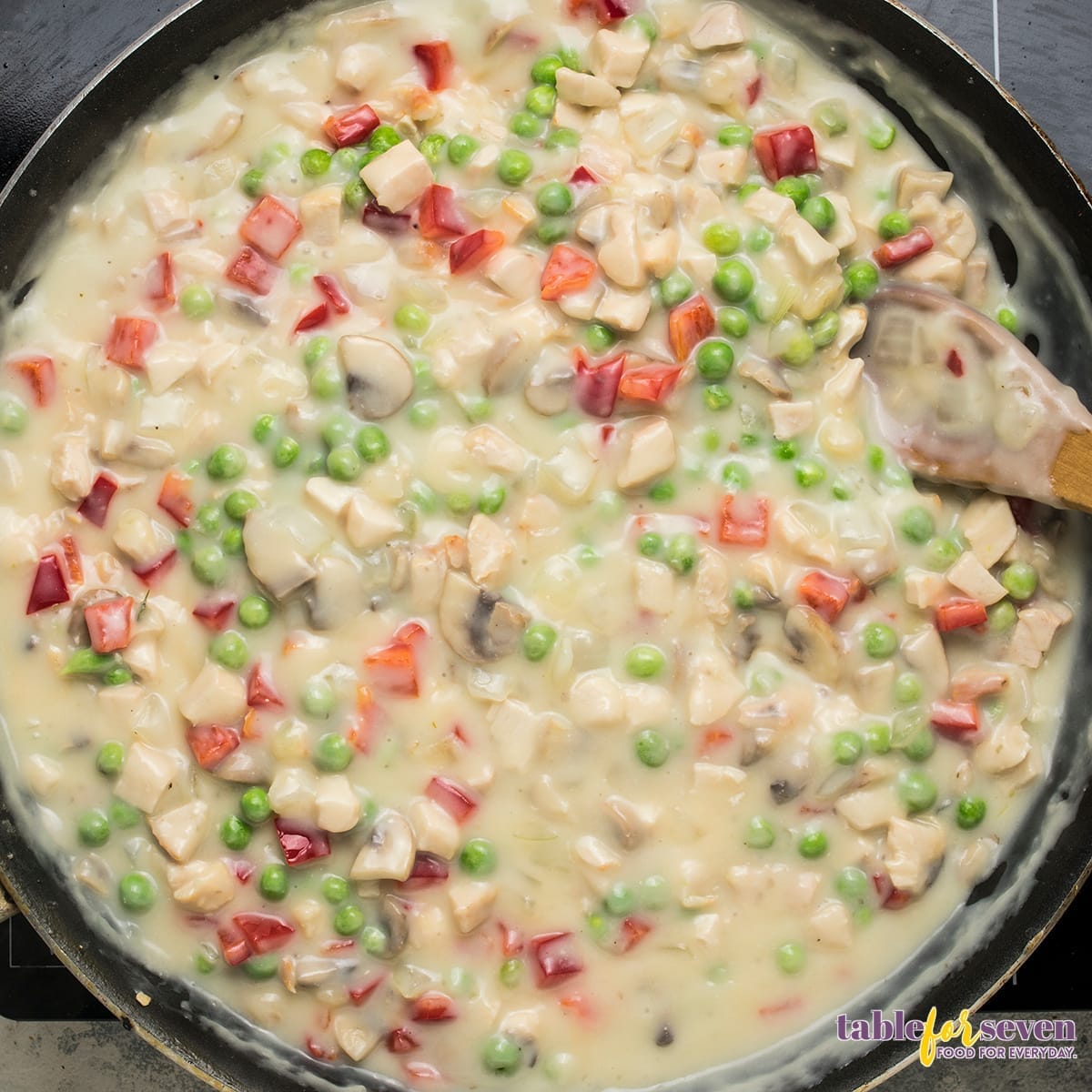 Creamy sauce for Chicken Ala King with cooked vegetables