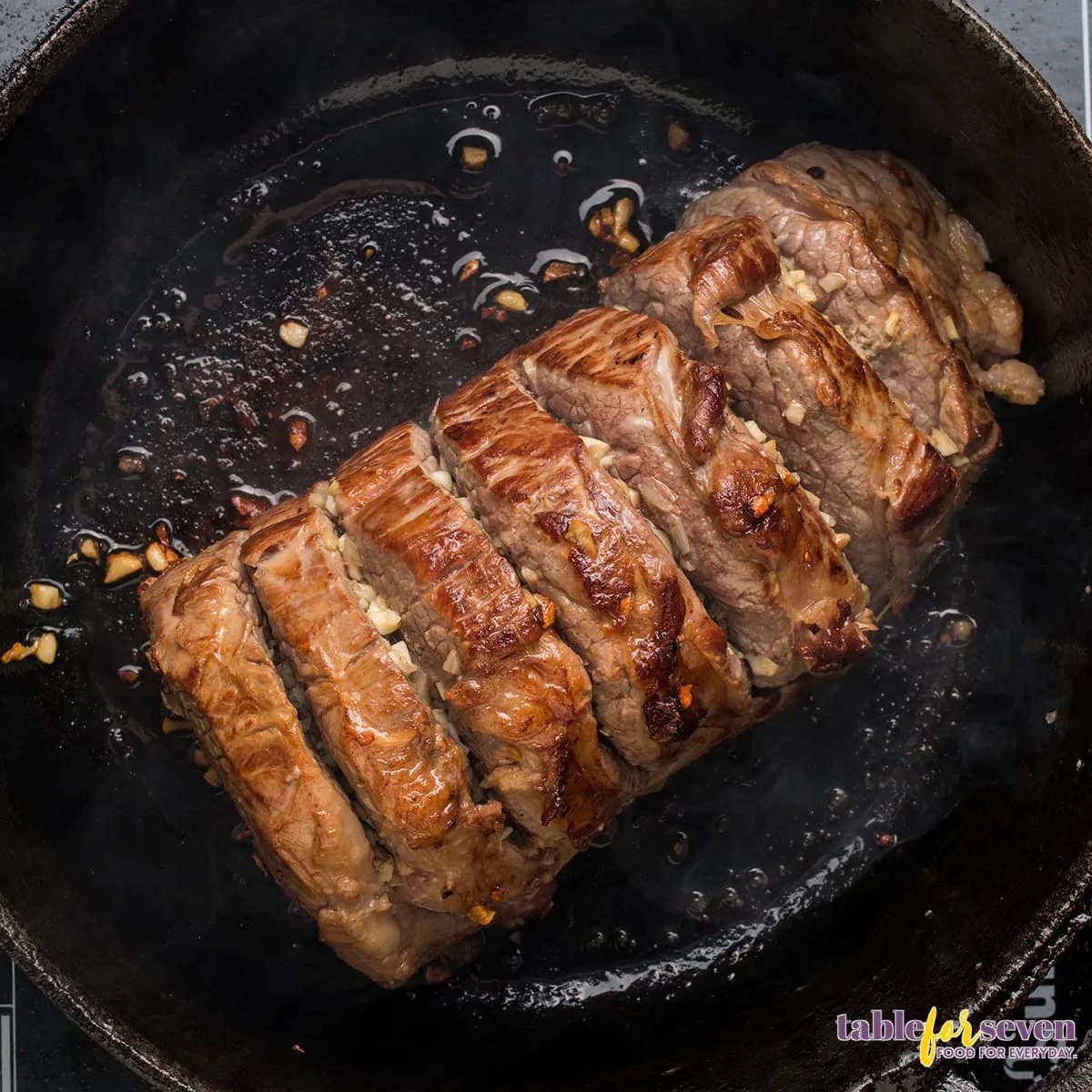 Roasted rump roast with golden brown crust and rosemary