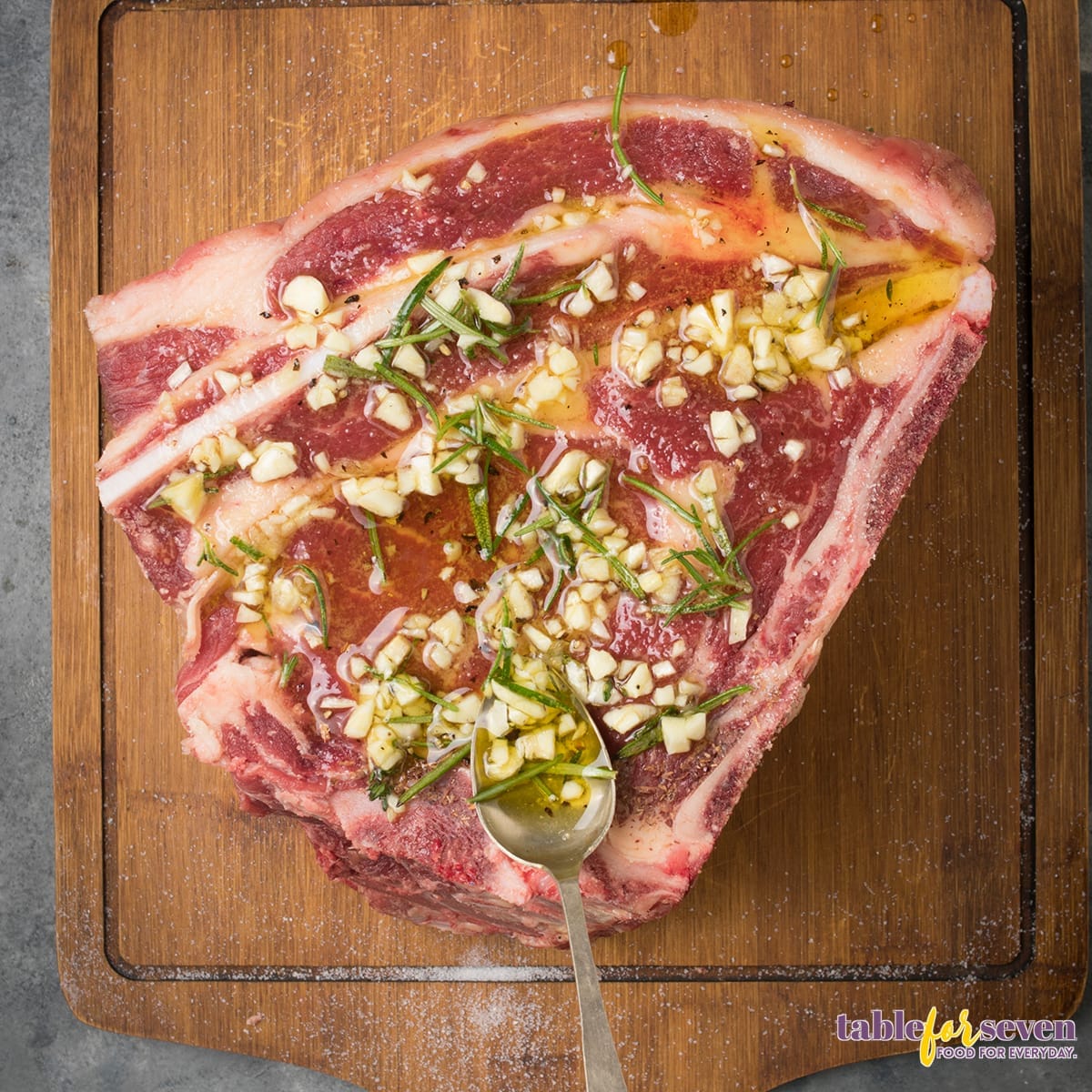 Garlic and rosemary seasoning being prepared for prime rib