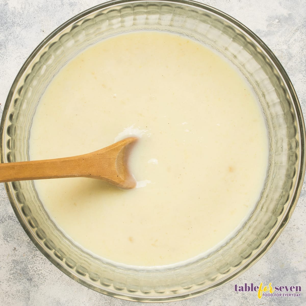 Mixing condensed soup and milk for Pioneer Woman Chicken and Dressing Casserole