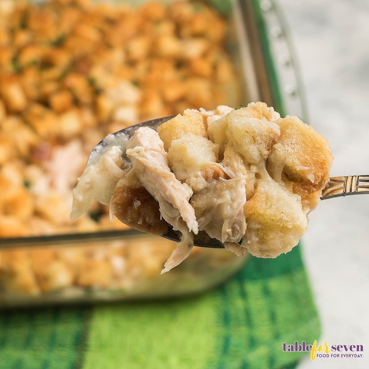 Spoonful of Pioneer Woman Chicken and Dressing Casserole with tender chicken and bread stuffing