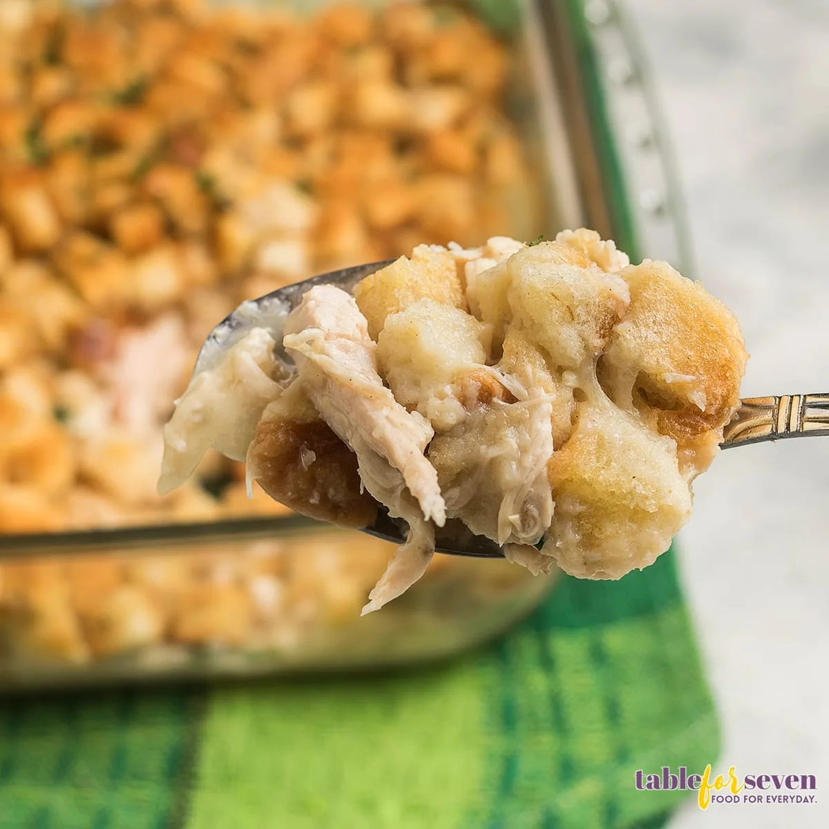 Spoonful of Pioneer Woman Chicken and Dressing Casserole with tender chicken and bread stuffing