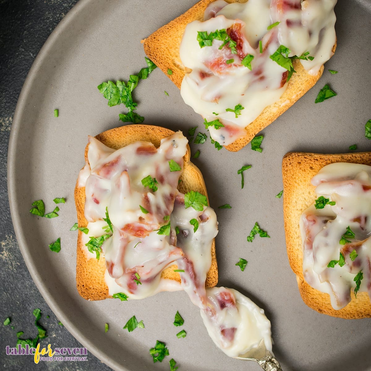 Top view of creamed chipped beef on toast garnished with parsle