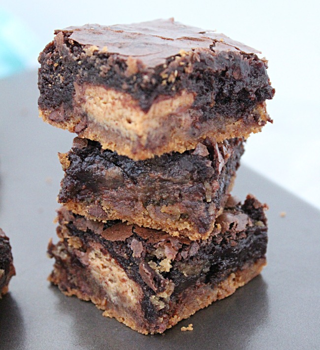 pile of Peanut Butter Cup Cookie Dough Brownies