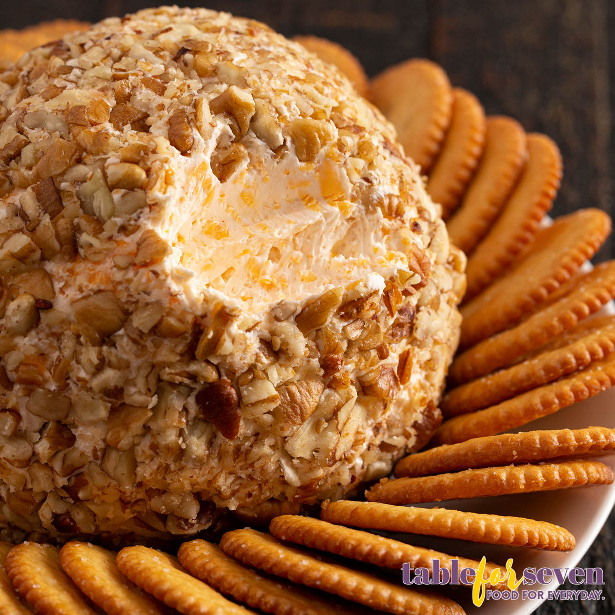 Cheese ball served with crackers