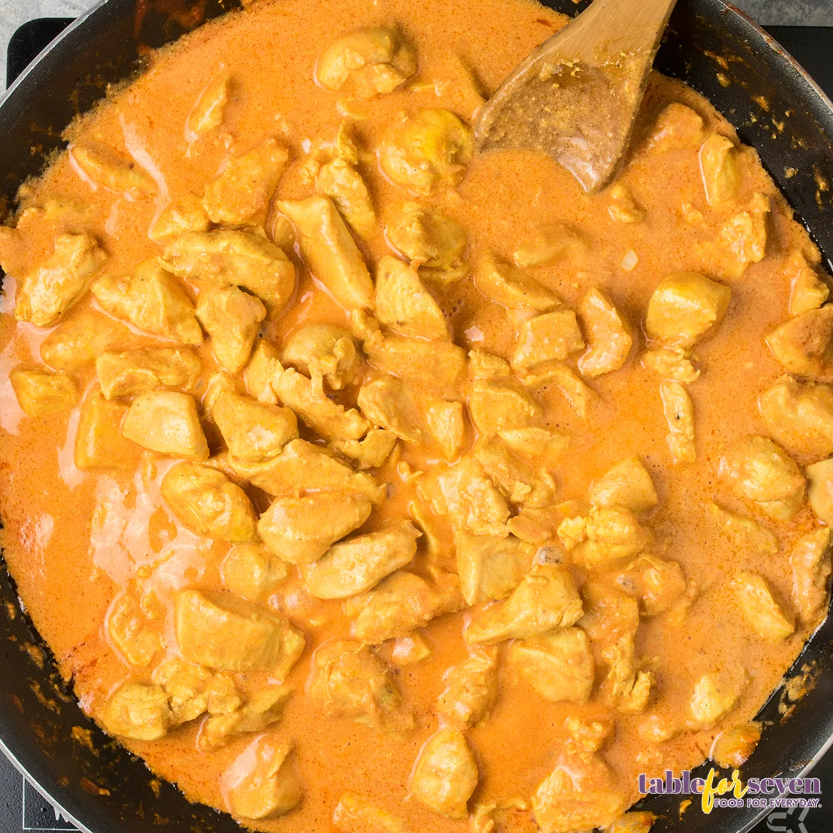 Final step of preparing butter chicken