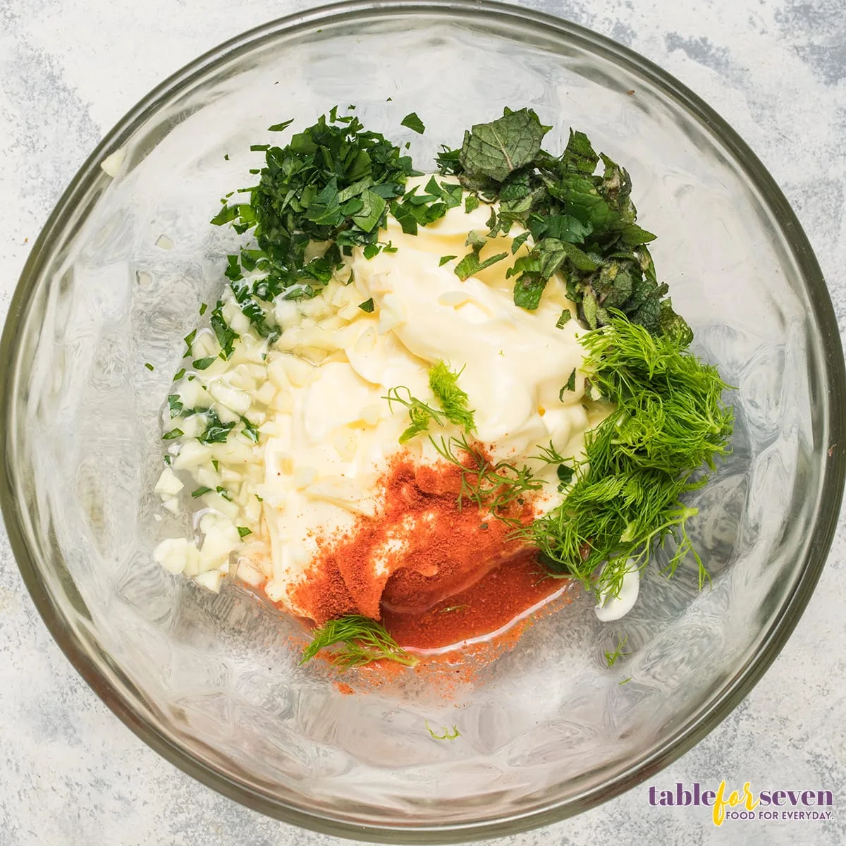 Ingredients for Gordon Ramsay Lamb Burger sauce in a glass bowl