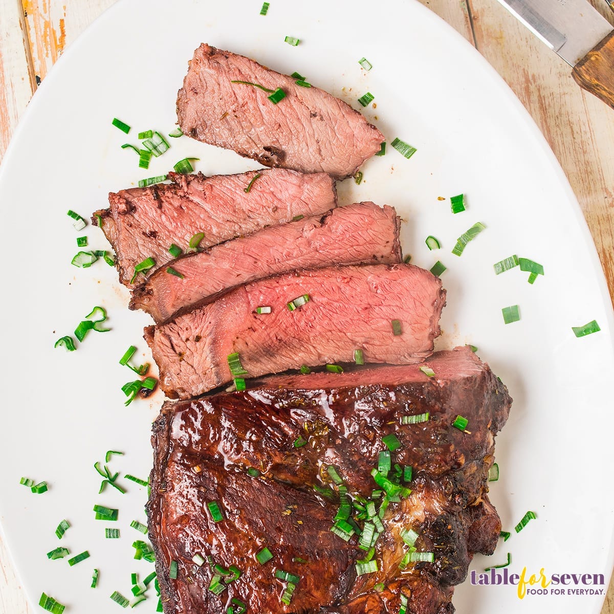 Top View of London Broil on White Plate