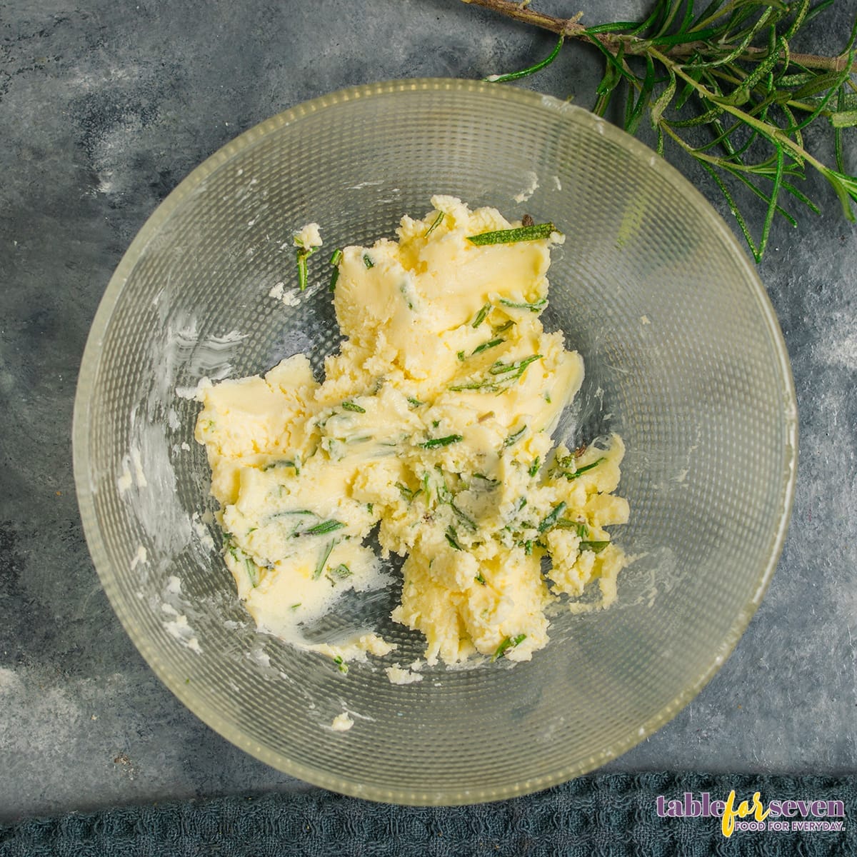 Herb butter in a glass bowl