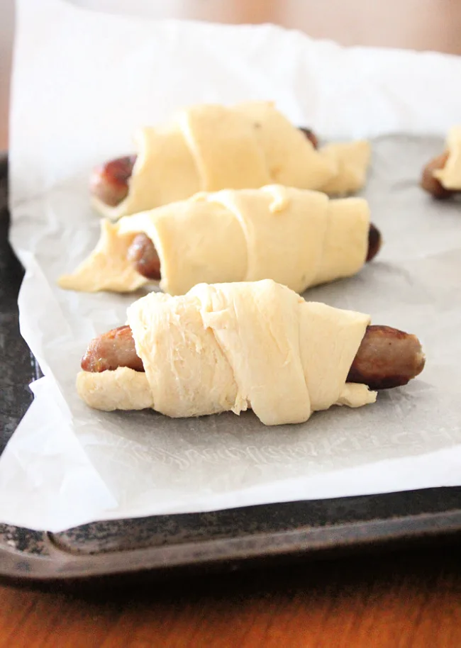 Sausage croissants on pan