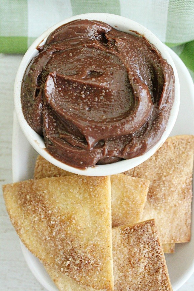 Baked Cinnamon Tortilla Chips with Chocolate Hazelnut Dip- Table for Seven #nutella #dip #cinnamonsugar #tortillachips #snacks #chocolatehazelnutspread 