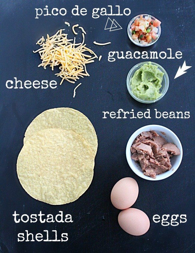 Breakfast Tostadas #tostada #breakfast #eggs #guacamole #tomatoes #cheese #tableforsevenblog 