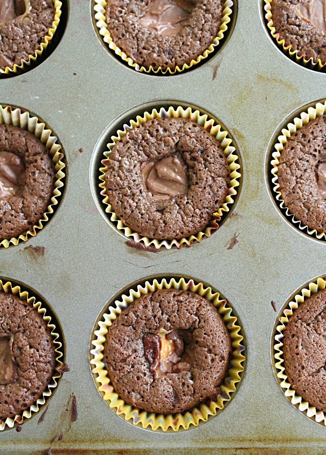 Candy Stuffed Brownie Cupcakes #tableforsevenblog #brownie #chocolate #cupcakes #brownies #dessert #candybar