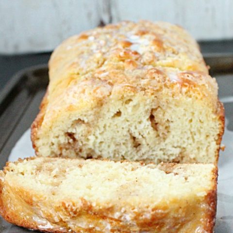 Cinnamon Roll Quick Bread #cinnamonroll #quickbread #cinnamon #glaze #dessert #bread #tableforsevenblog @tableforseven