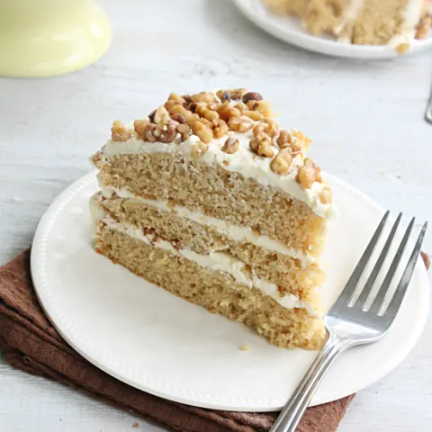 Maple Walnut Cake with Maple Buttercream Frosting #maple #cake #layercake #walnut #dessert #tableforsevenblog